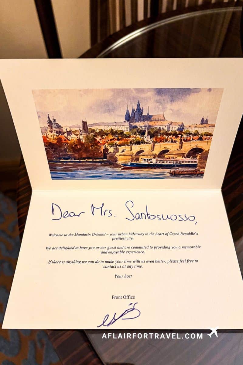 Personalized welcome card with Prague watercolor illustration from Mandarin Oriental front office
