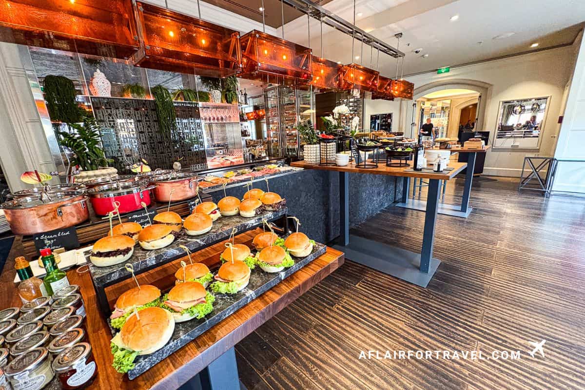 Breakfast buffet at Four Seasons Prague with sliders, pastries, and copper pots