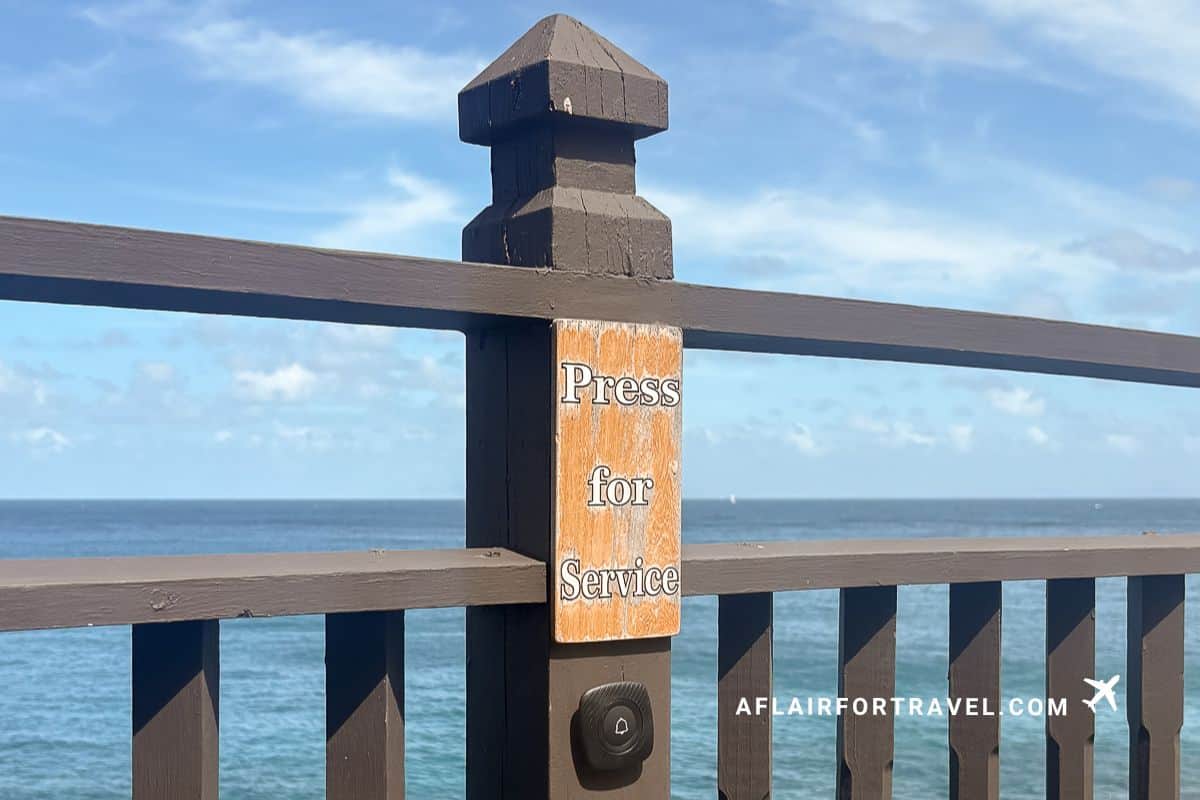 Press for service button on oceanfront terrace railing at Cap Maison St. Lucia luxury resort