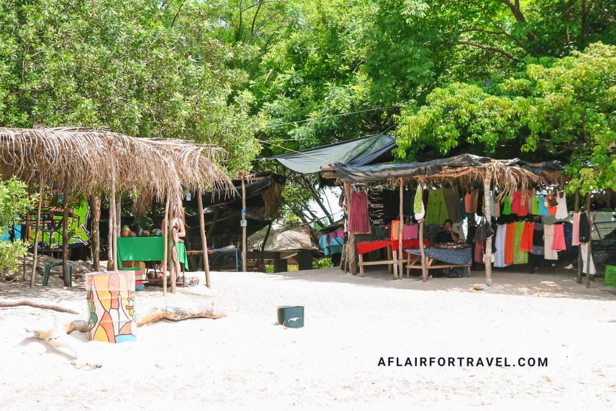 Beachside market stalls in Costa Rica, highlighting why carrying cash helps avoid common Costa Rica travel mistakes