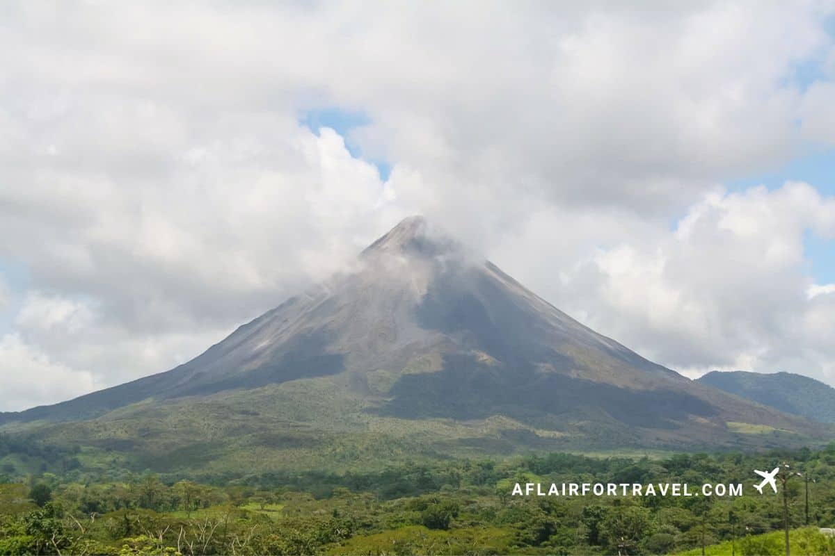 Arenal Volcano rising above lush rainforest in Costa Rica, one of the country’s most iconic natural landscapes
