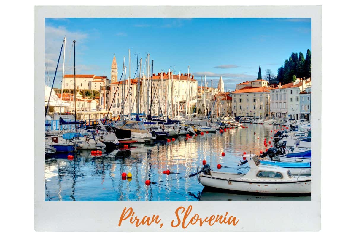 Colorful harbor and waterfront buildings in Piran, Slovenia at sunset. If you're planning a trip to Slovenia, you can include other countries in your itinerary with the ferry service out of Piran.