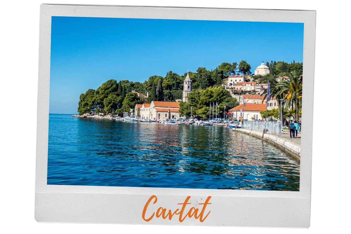 The picturesque harbour town of Cavtat with its waterfront promenade, church bell tower, and calm Adriatic waters, an easy and romantic day trip from Dubrovnik