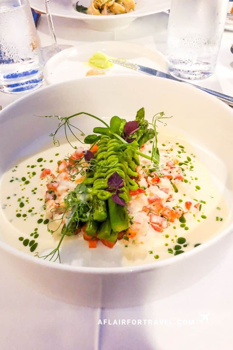 An elegantly plated asparagus and seafood dish in a cream sauce, served at Above 5 restaurant at Boutique Hotel Stari Grad Dubrovnik.