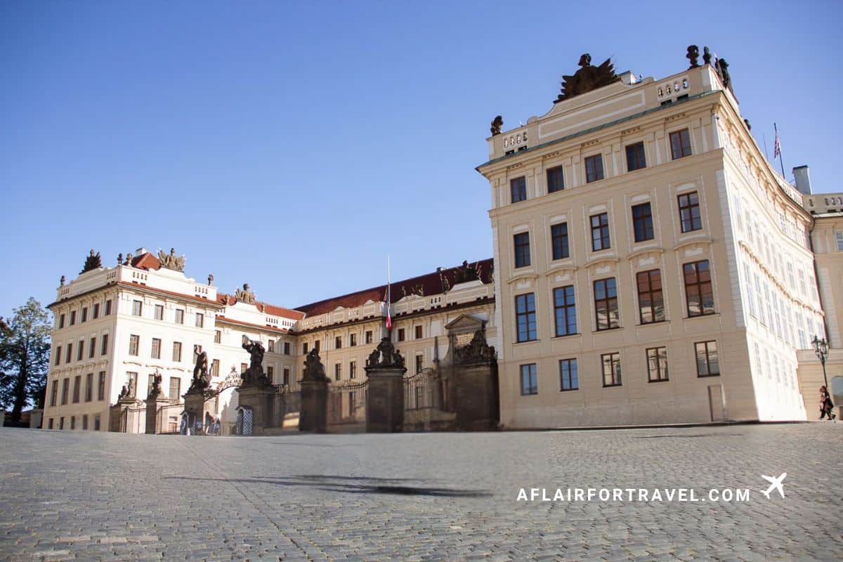 Prague Castle's main courtyard, framed by gates and statues