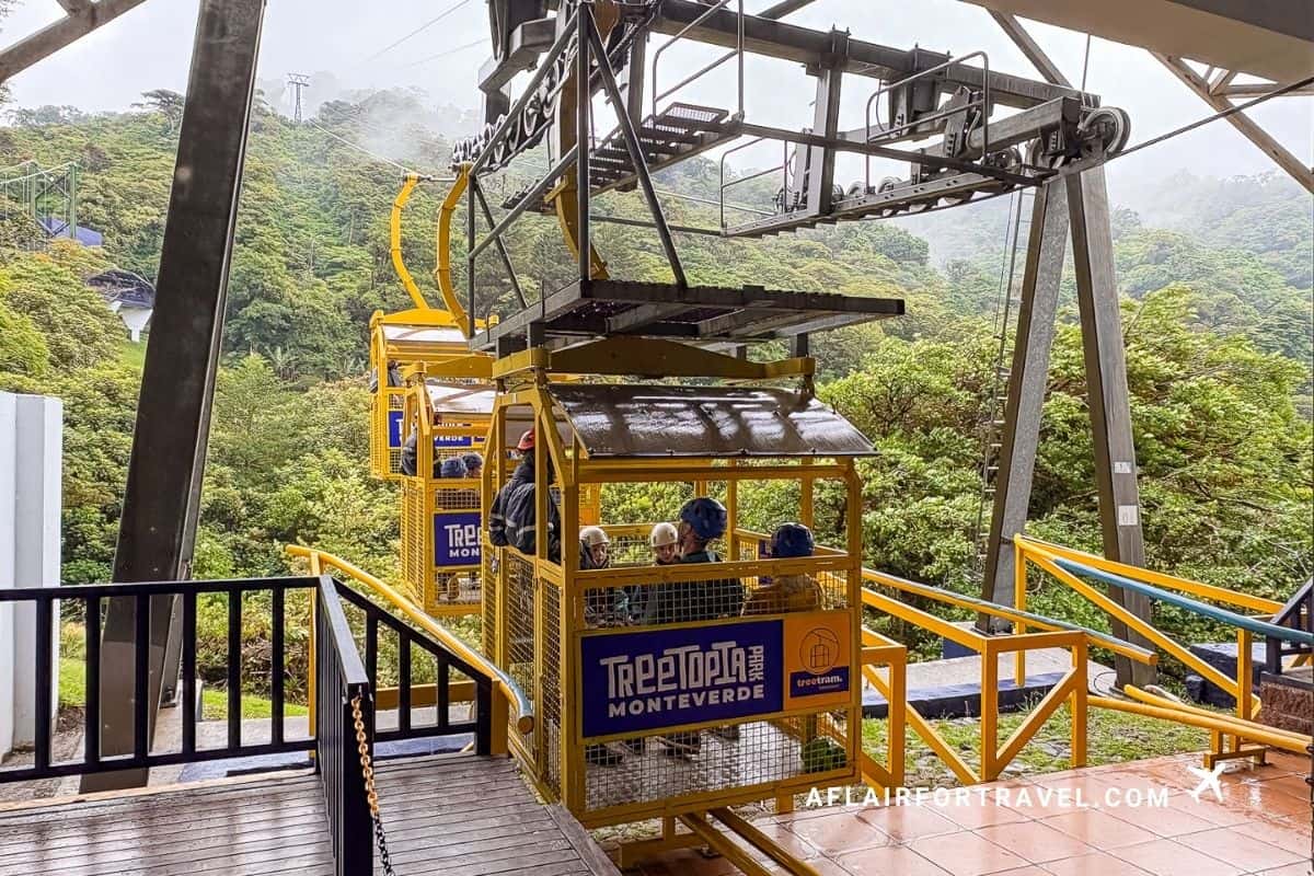 Treetopia Park cable car gondola carrying visitors through the misty forest canopy in Monteverde, Costa Rica