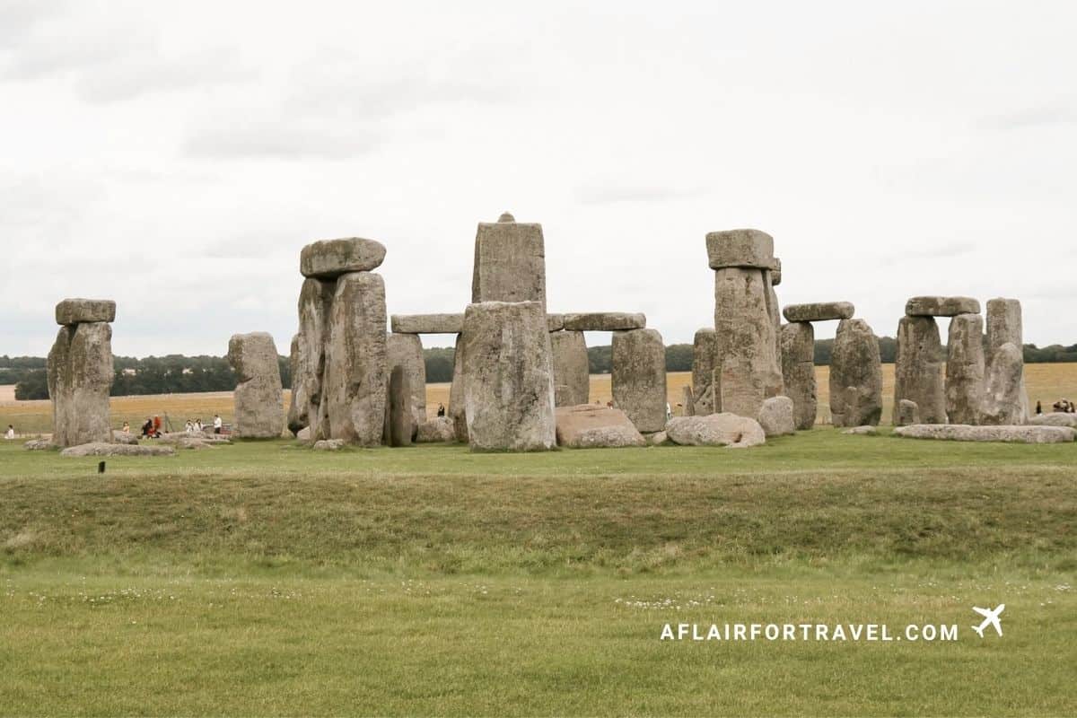 Stonehenge's ancient stone circle set against a cloudy sky in Wiltshire, England