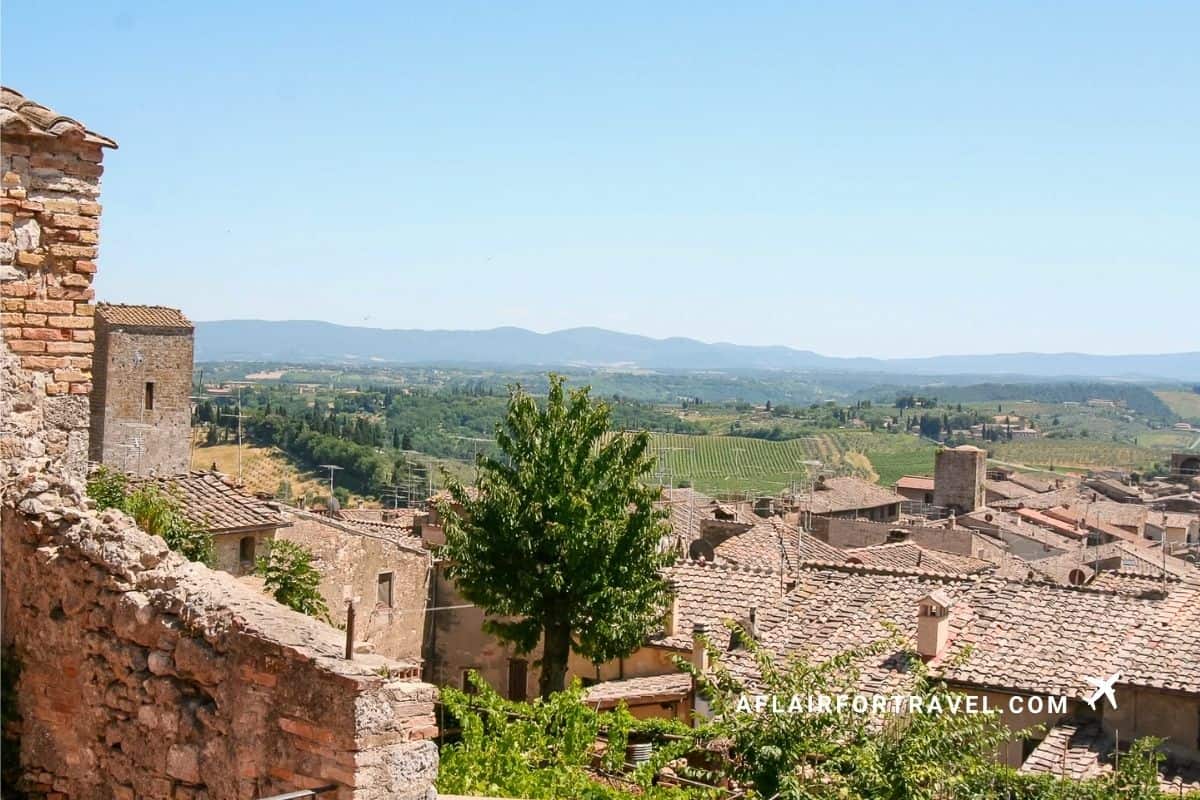 Rooftop view of San Gimignano's medieval towers overlooking the Tuscan countryside