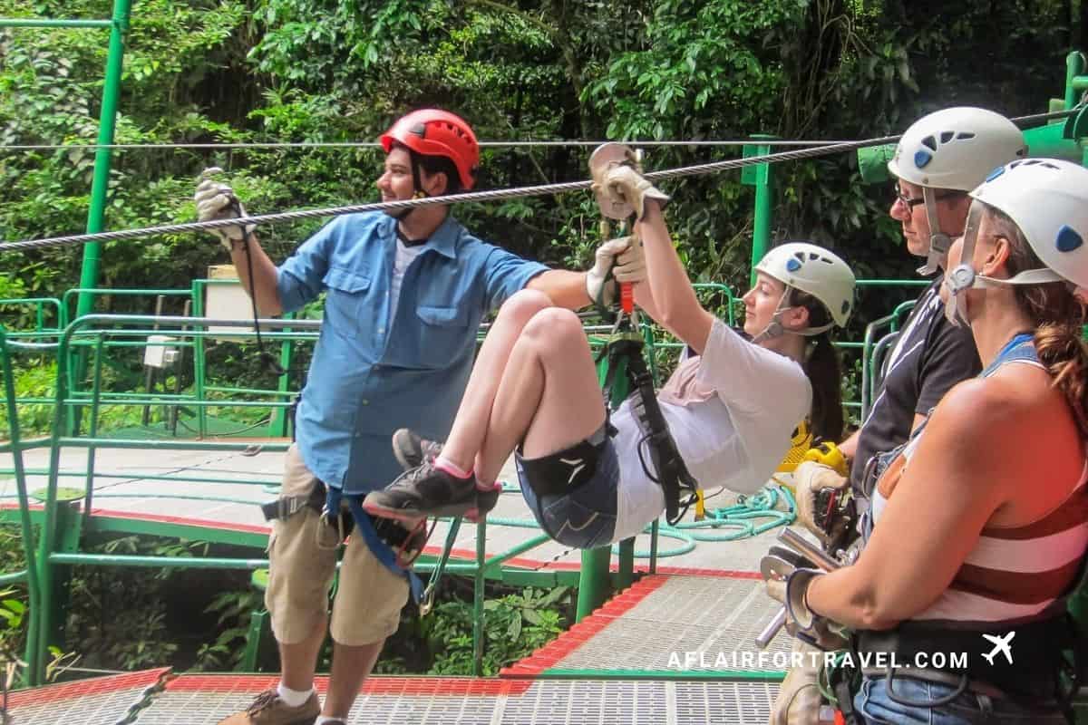 Zipline rider getting ready to soar above the treetops, one of the most popular things to do in Monteverde, Costa Rica