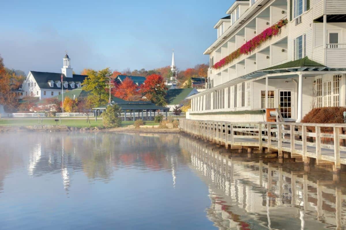 New Hampshire fall scenery overlooking Lake Winnipesaukee with colorful autumn foliage.
