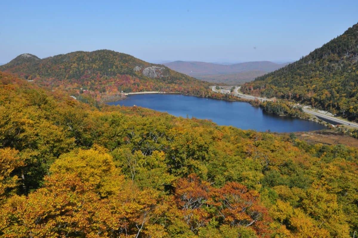 Aerial view of Echo Lake surrounded by fall foliage, White Mountains