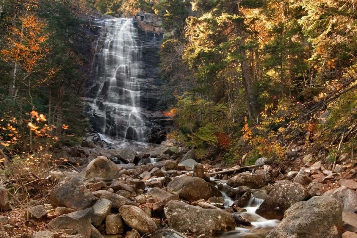 Arethusa Falls cascading down a rock cliff in the White Mountains