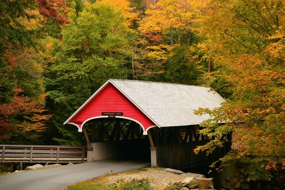 Flume Covered Bridge over the Pemigewasset River in fall, New Hampshire