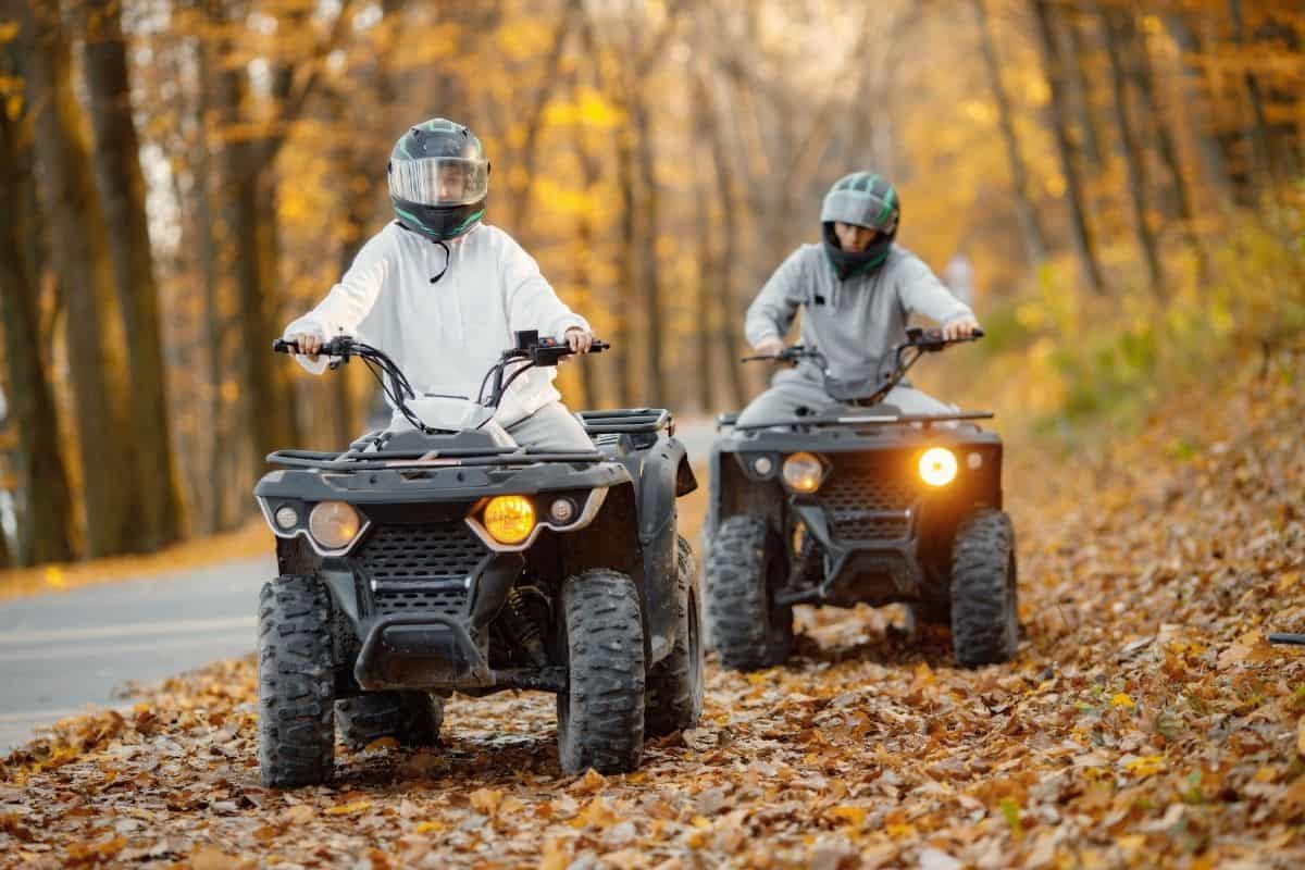 ATV riding through colorful fall foliage is one of the New Hampshire fall activities for adventure seekers