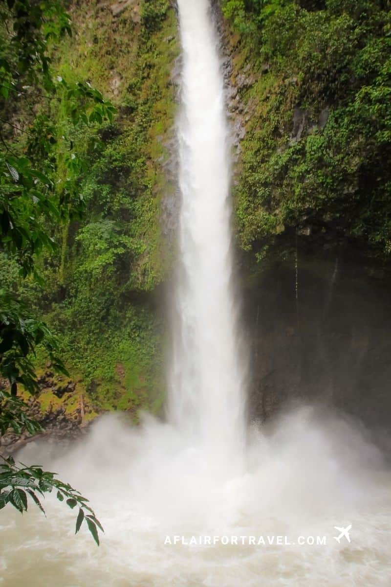 La Fortuna Waterfall cascading through the rainforest near Arenal