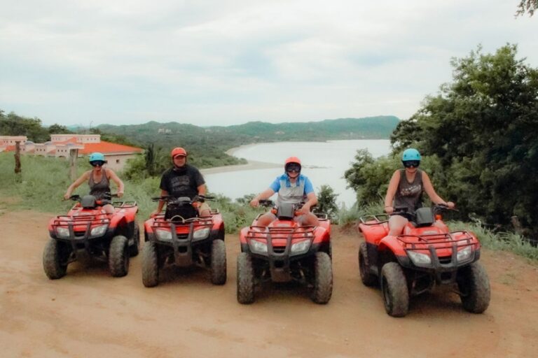 Family of four on ATVs pause for a scenic overlook during a Guanacaste quad tour