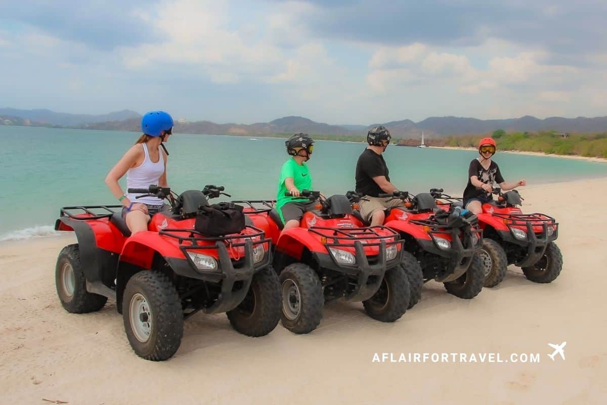 Family of four on an ATV tour along the beach in Costa Rica