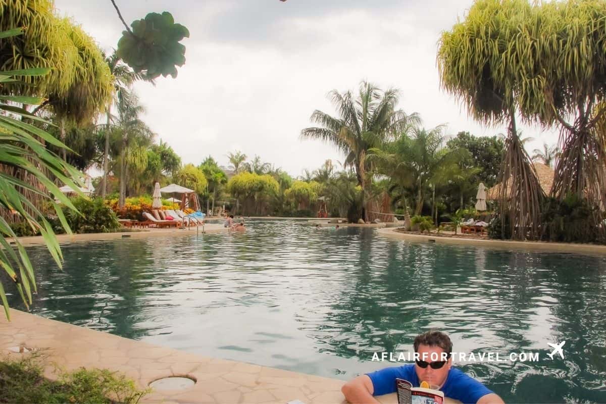 Relaxing poolside with a book and a drink, is an all-inclusive resort in Guanacaste, Costa Rica worth it for downtime like this?