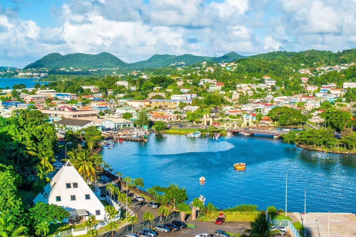 Aerial view of Castries, St. Lucia's capital city, with its harbor and pyramid-roofed building